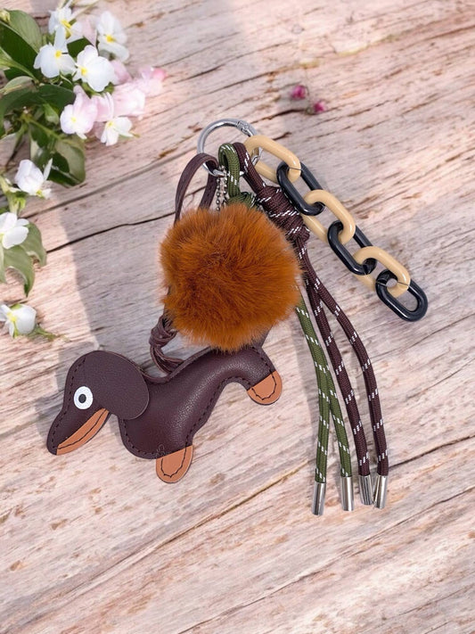 Taschenanhänger und Schlüsselanhänger mit Hund und Bommel