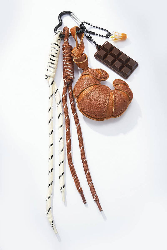 Taschenanhänger und Schlüsselanhänger Croissant